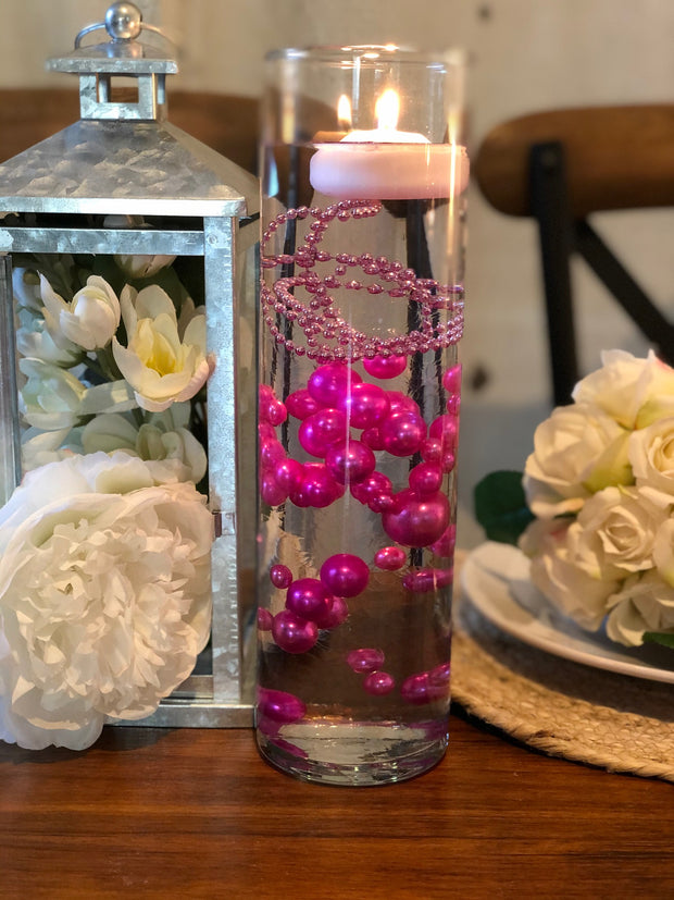 Create decor that will blow your guests' minds! Floating pearled candl